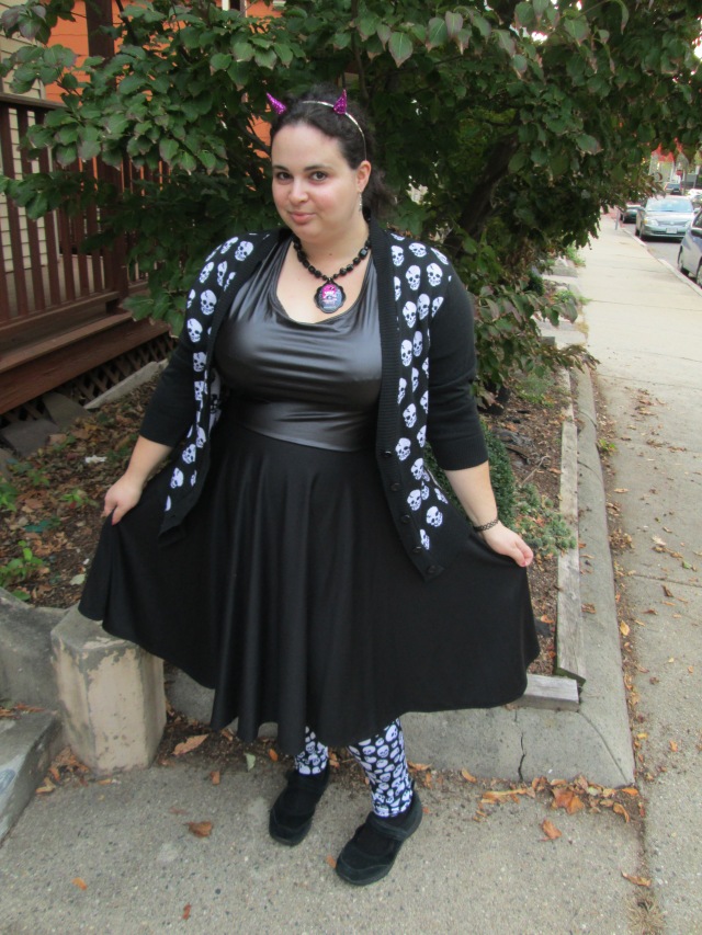 plus size goth outfit with skulls and pink devil horns