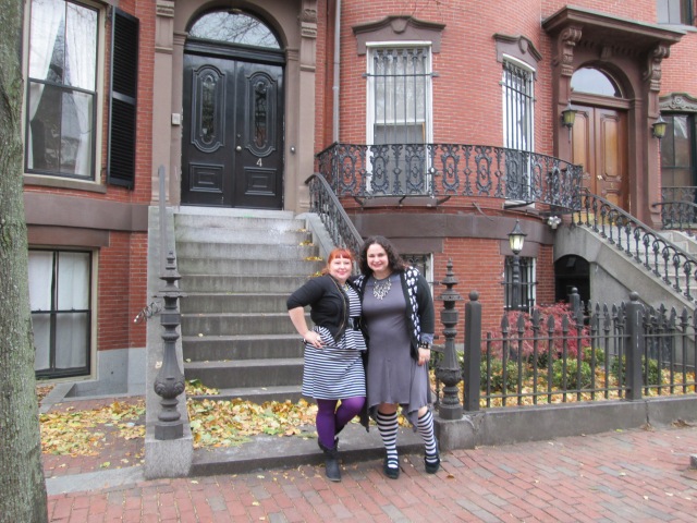 me and my friend in matching striped and gray outfits in frot of brownstone