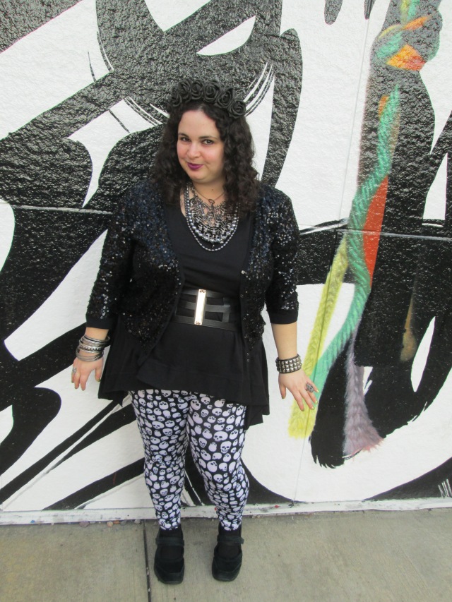 plus size all black goth outfit with graffiti background