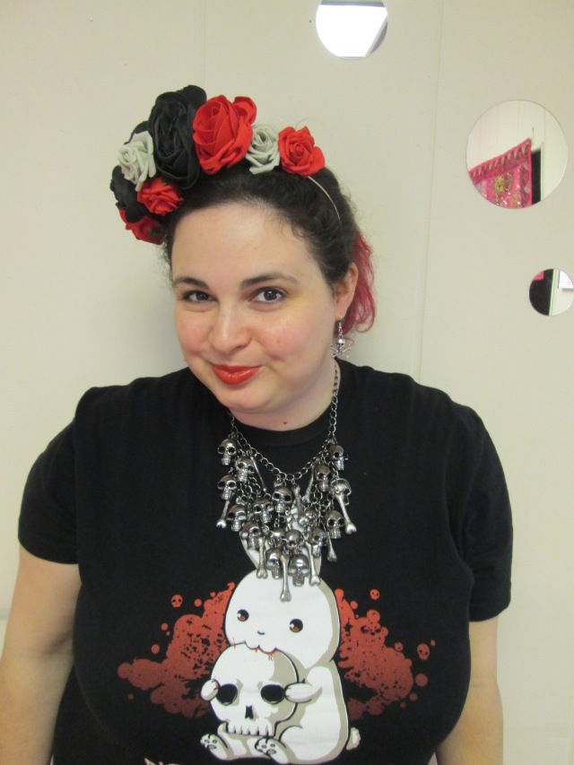 plus size outfit with evil bunny t-shirt, skull necklace, and red black gray flower crown